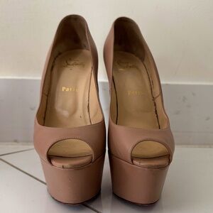 Christian Louboutin Nude Platform Heels, Size 9.5, Pre-loved with visible wear.